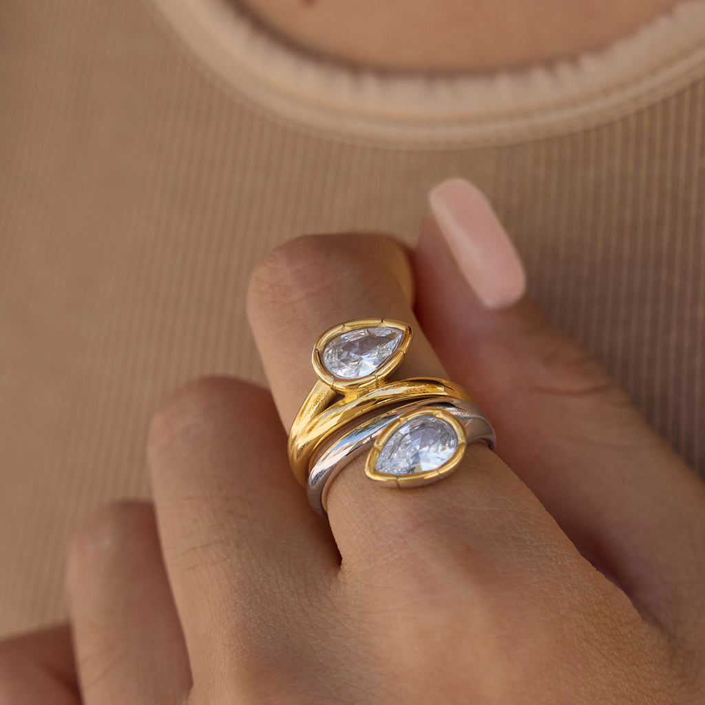Two pear zirconia rings stacked for styling