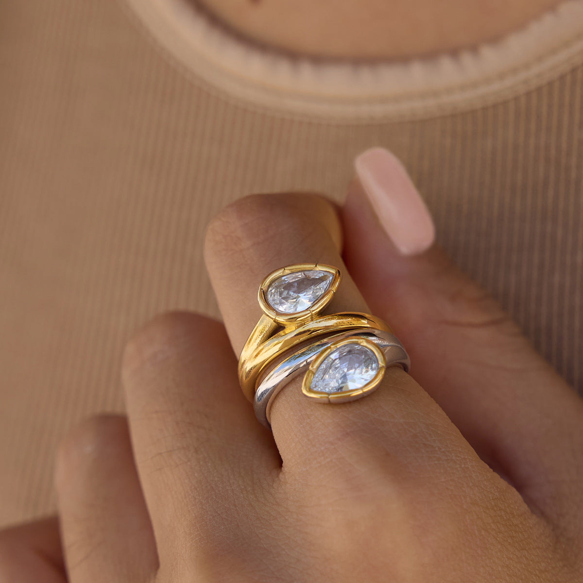 Two pear zirconia rings stacked for styling
