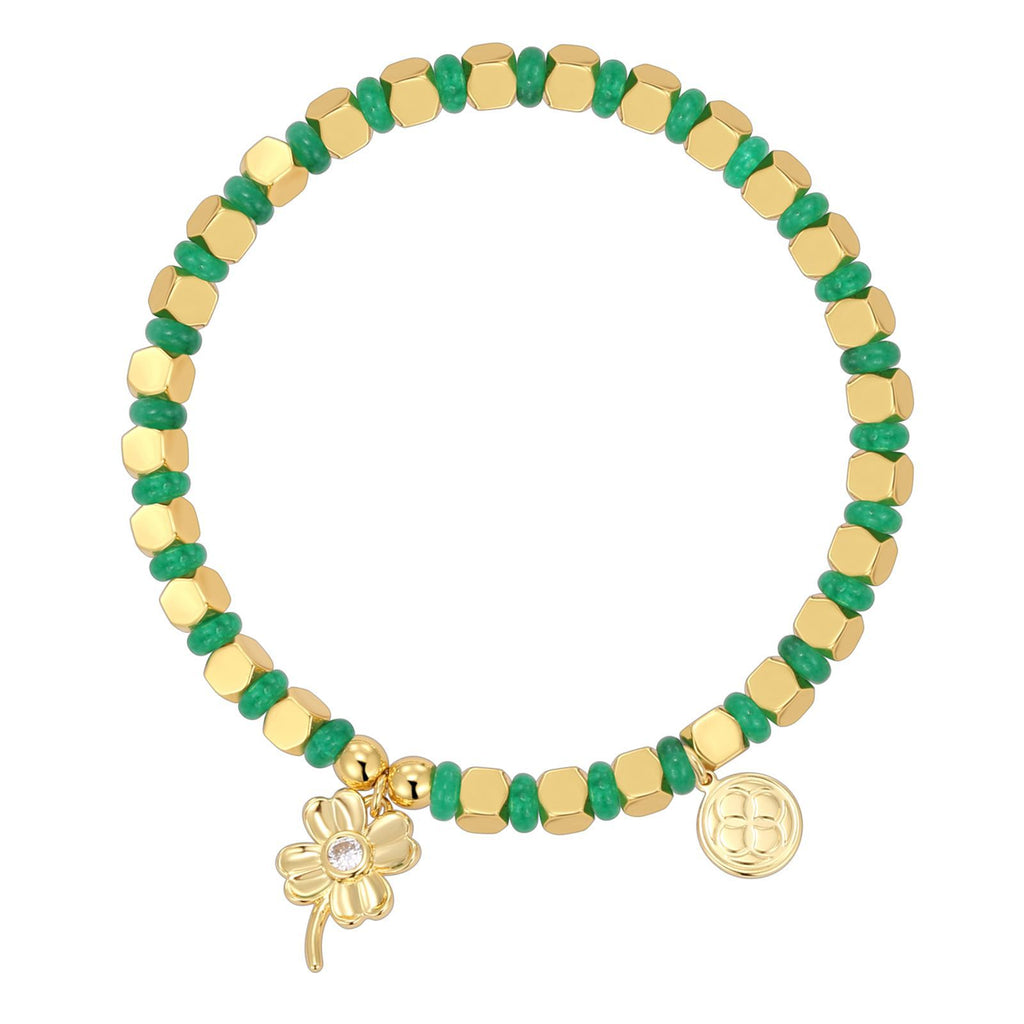 isolated gold plated clover charm bracelet with green disc beads