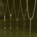Gold-Tone Clear Stone Stainless Steel Y Necklace Collection — five-necklace assortment