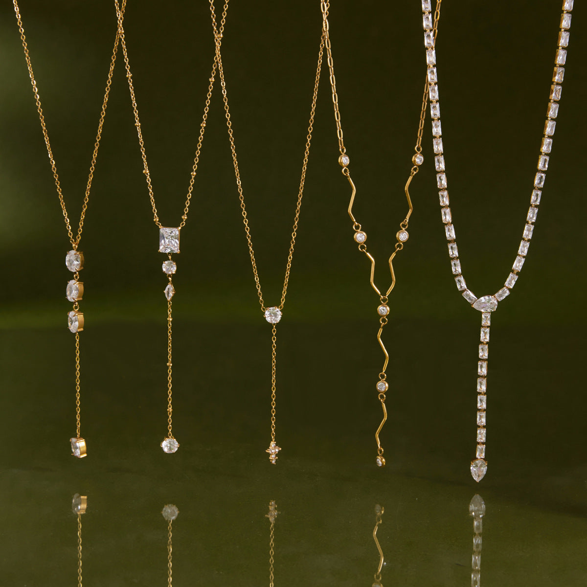 Gold-Tone Clear Stone Stainless Steel Y Necklace Collection — five-necklace assortment