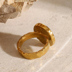 Side view of textured gold plated stainless steel ring