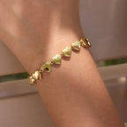 Repeating polished heart links shown in close-up