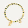 gold plated palm tree charm bracelet with green and ivory beads