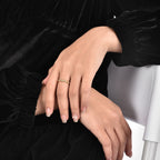 model wearing the slim textured gold plated bead ring