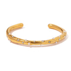 Gold Plated Stainless Steel Wavy Pearl and Clear Stone Cuff Bracelet — side profile