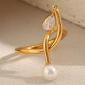 gold plated knotted open ring with imitation pearl and clear stone