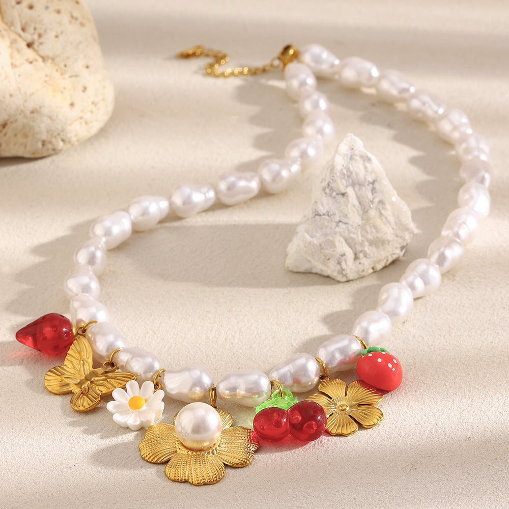multicolor stainless steel charm necklace styled with a white tassel