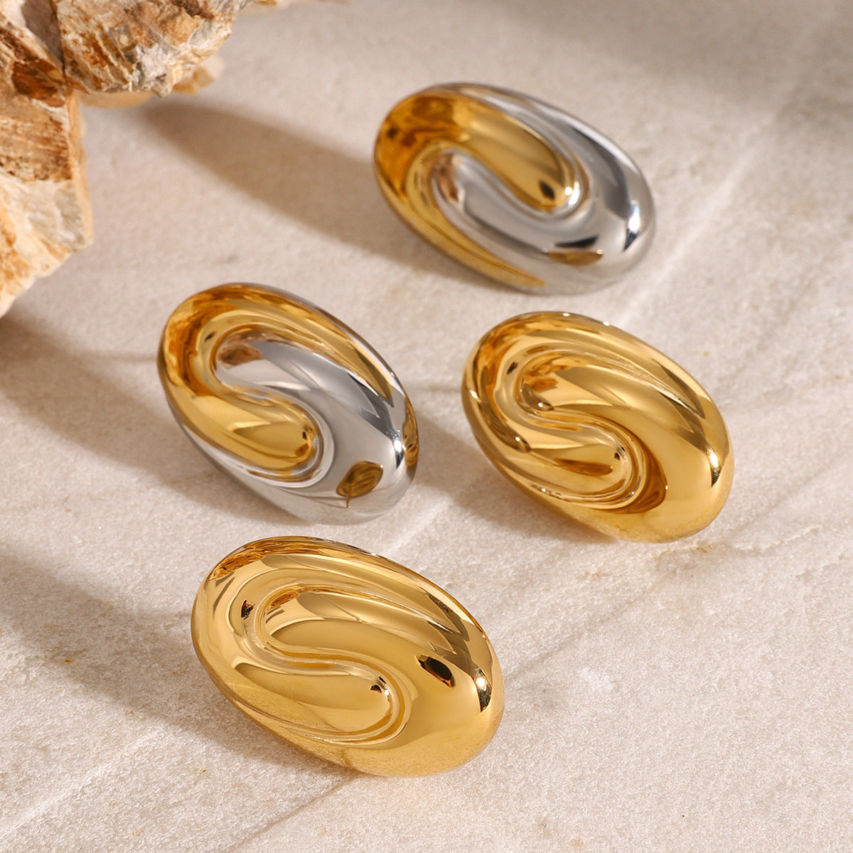 Geometric Stainless Steel Stud Earring Collection shown on model