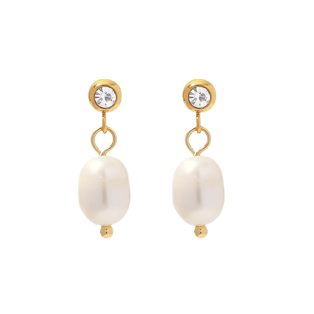 front cutout of stainless steel earrings with clear posts and pearl drops