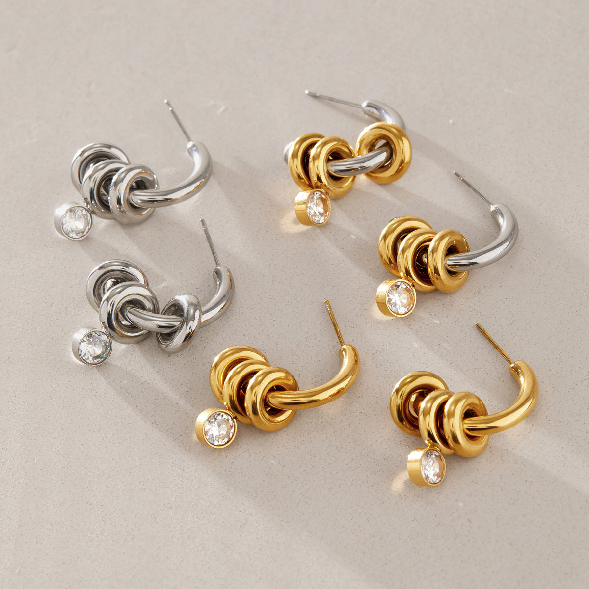 Ring-accent hoops shown in multiple color combinations