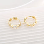 back and side view of gold plated chain-link hinged hoops