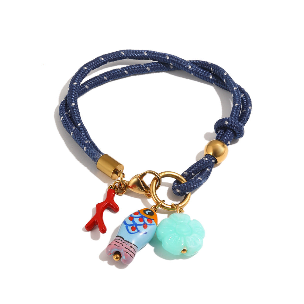 Navy rope bracelet with blue fish and pale turquoise flower