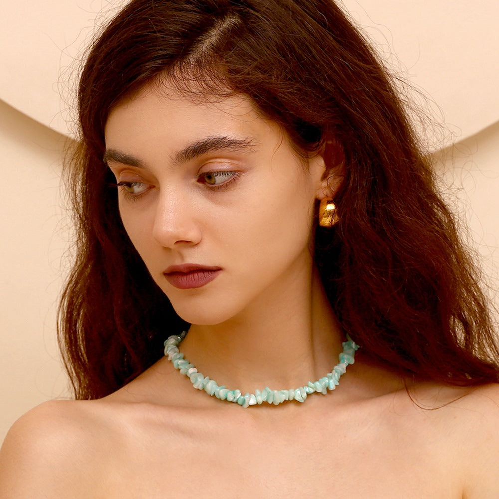 Short aqua stone chip necklace worn on model