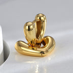 gold plated rounded heart huggie earrings with hinged closures