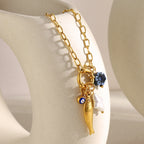 Paperclip fish pendant necklace clasp and chain detail