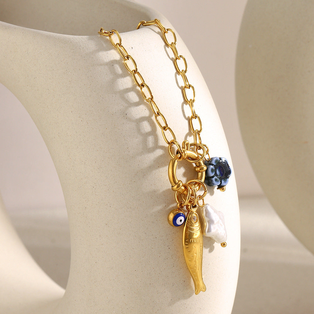 Paperclip fish pendant necklace clasp and chain detail