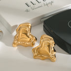 Gold-Tone Sculptural Heart Stainless Steel Stud Earrings in Two Sizes – close-up view