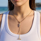 Link-chain fish necklace with long T-bar drop worn on model