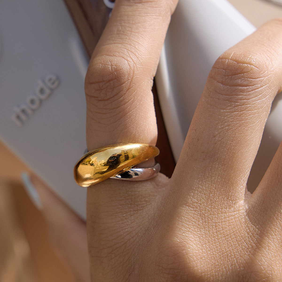 Mixed-metal crossover ring side view while worn