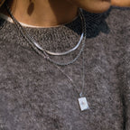 Silver-color layered stainless steel star pendant necklace worn