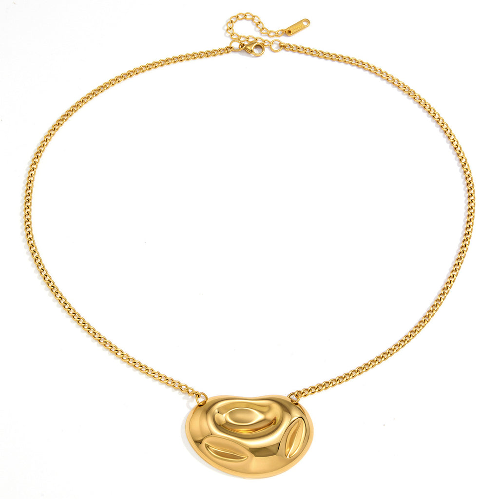 Rounded swirl pendant and linked chain on white