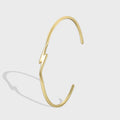 angled catalog view of gold plated lightning bolt open bangle