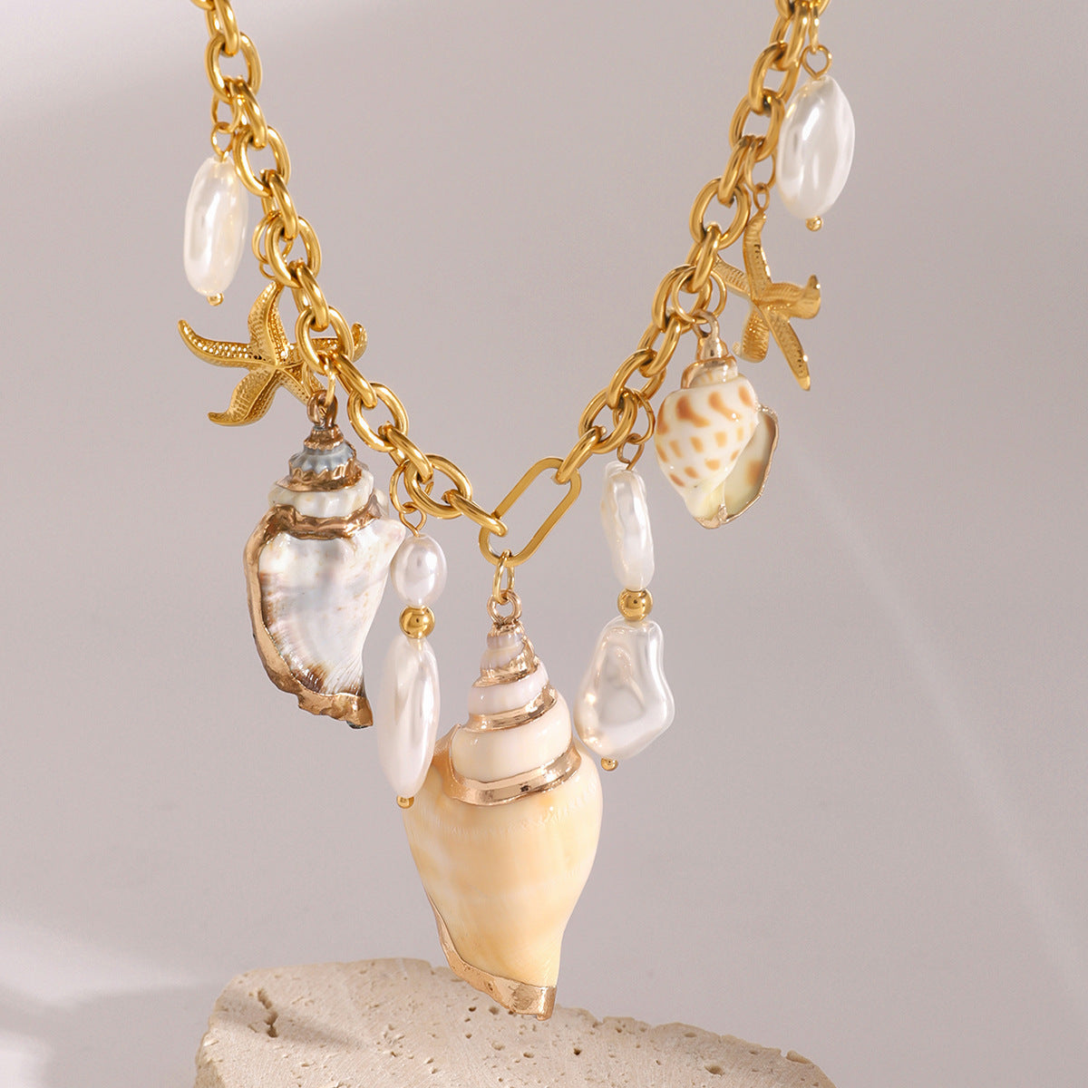 Gold-Tone Shell and Pearl-Look Stainless Steel Charm Necklace styled product view