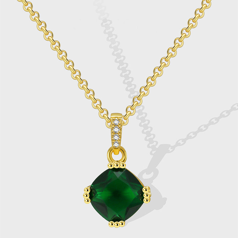 gold plated brass necklace with deep green cushion stone pendant