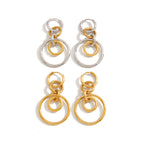gold plated and two-tone multi-ring earring pairs on white