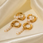 Asymmetric and matching pearl hoop options on fabric