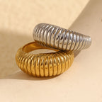gold plated and silver-finish stainless steel ribbed dome rings
