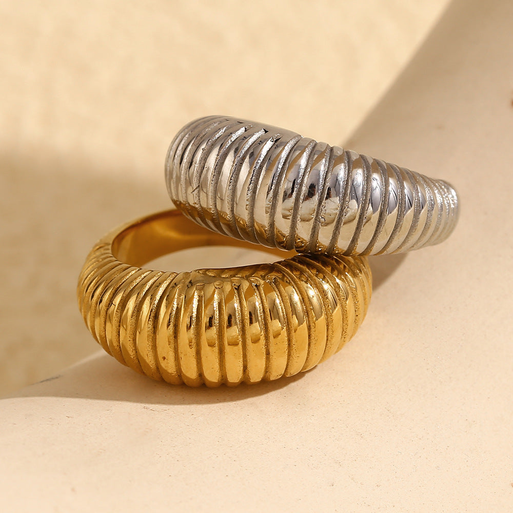 gold plated and silver-finish stainless steel ribbed dome rings