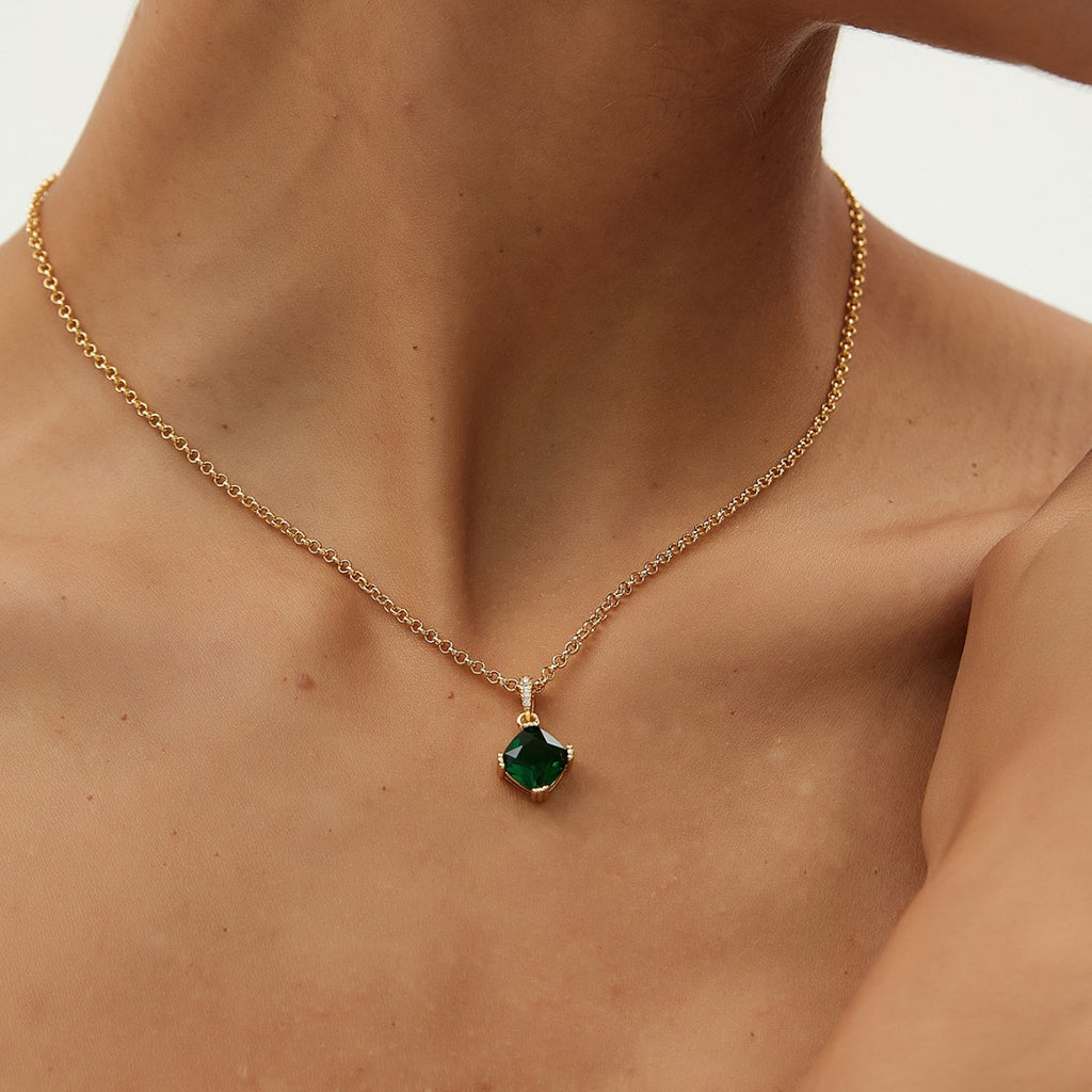 model wearing the green cushion stone pendant necklace