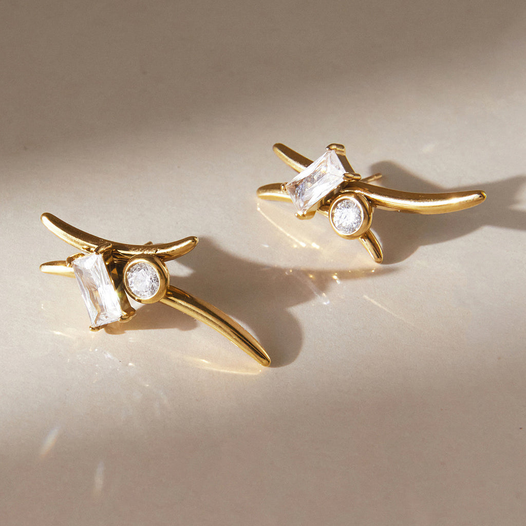 Angled view of rectangular and round clear stone settings
