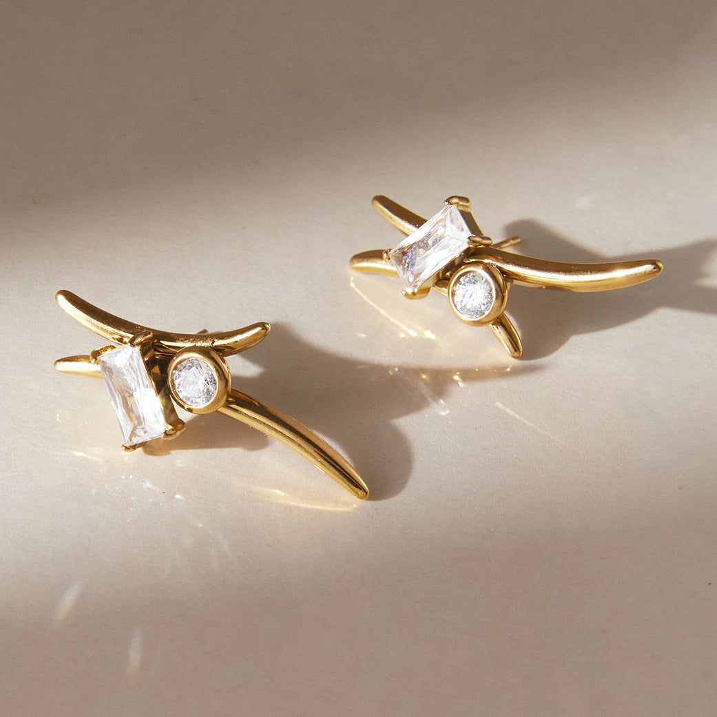 Angled view of rectangular and round clear stone settings