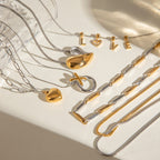 Mixed-Finish Stainless Steel Heart Necklace Collection styled product view