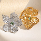 sculpted five-petal green stone rings in gold and silver finishes