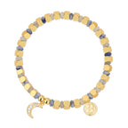 isolated blue dot quartz bracelet with clear stone crescent charm