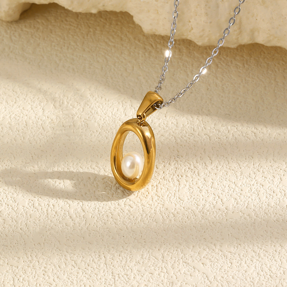 Gold Plated and Silver 316L Stainless Steel Oval Pearl Necklace — oval frame and pearl accent on stone