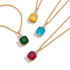 Colored pendant settings arranged on white