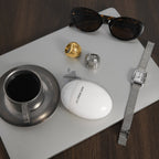 gold plated and silver-finish open lattice rings on a tabletop
