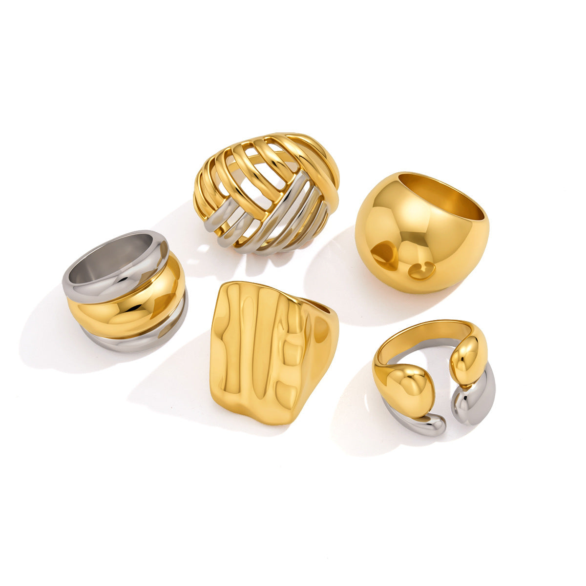 Sculpted stainless steel ring assortment on white