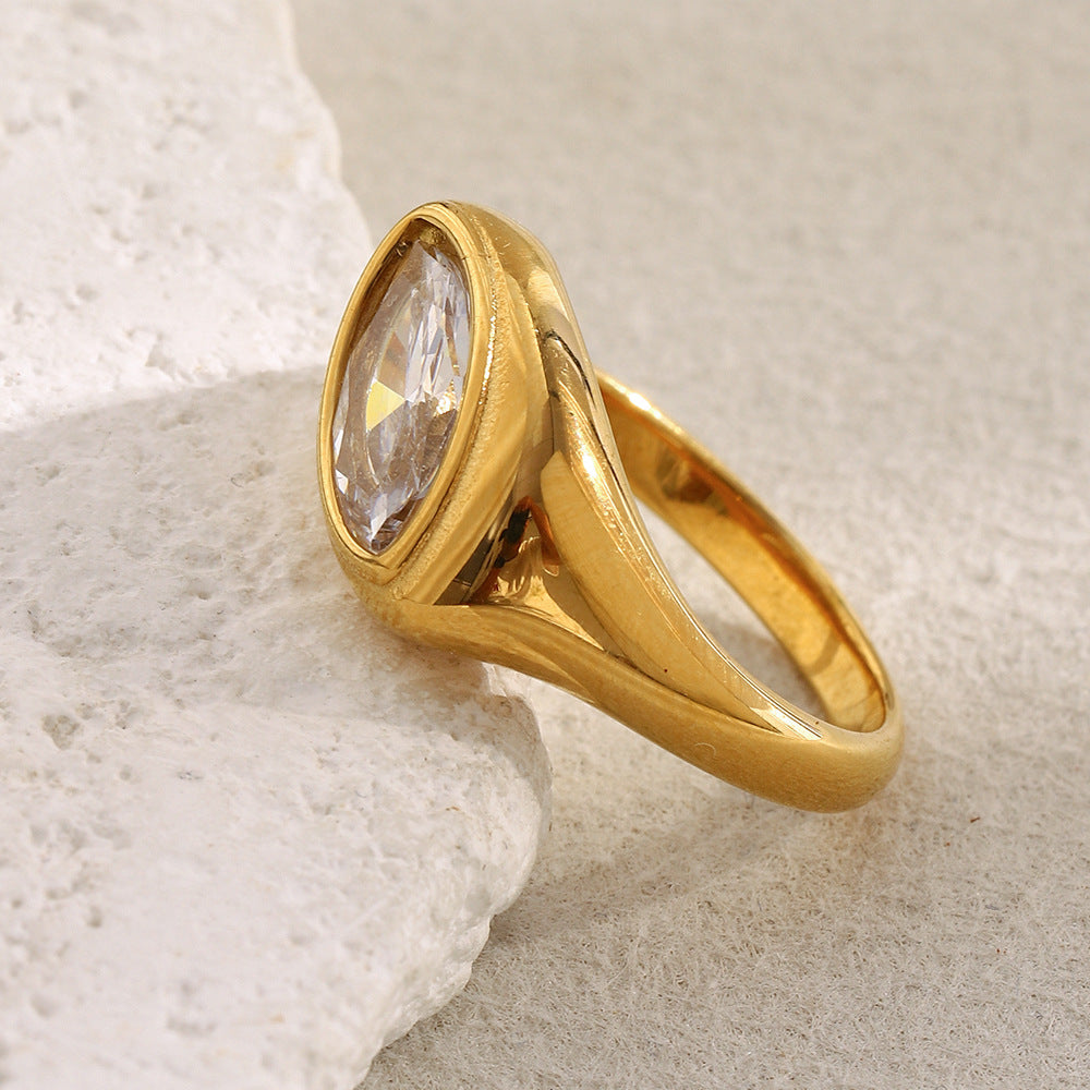profile view of the gold plated marquise clear stone signet ring
