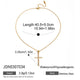 Slender clear-accent cross on a fine chain