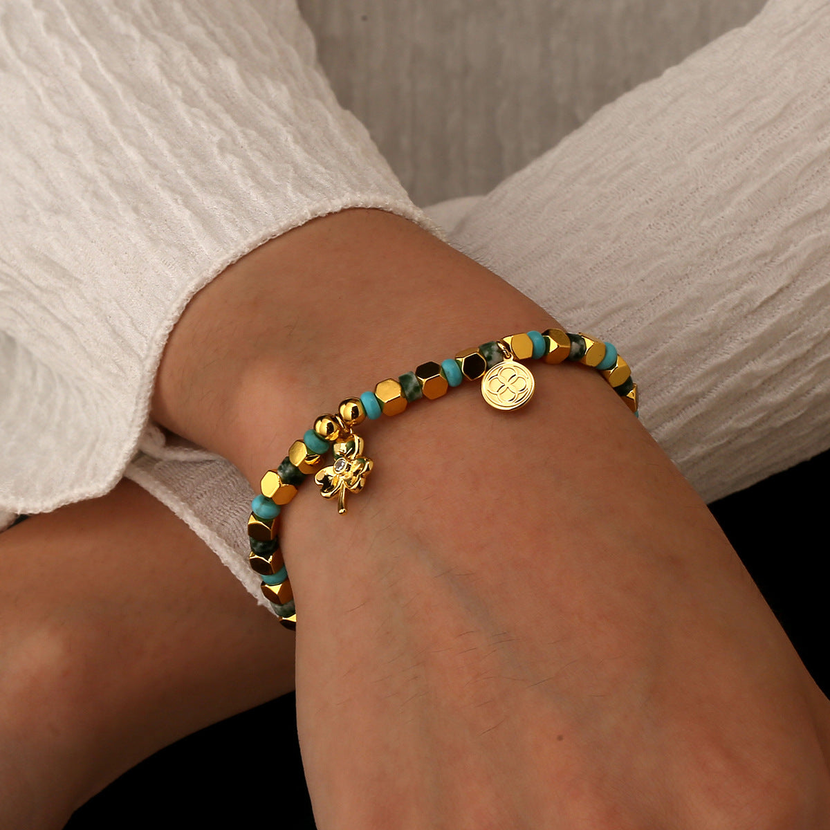 model wearing the multicolor clover bead bracelet