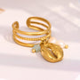 gold plated cowrie charm open ring with pearls and blue star bead