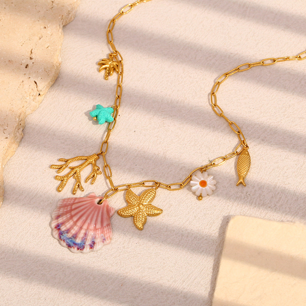 Gold Plated Stainless Steel Coastal Charm Link Necklace — coastal charm close-up