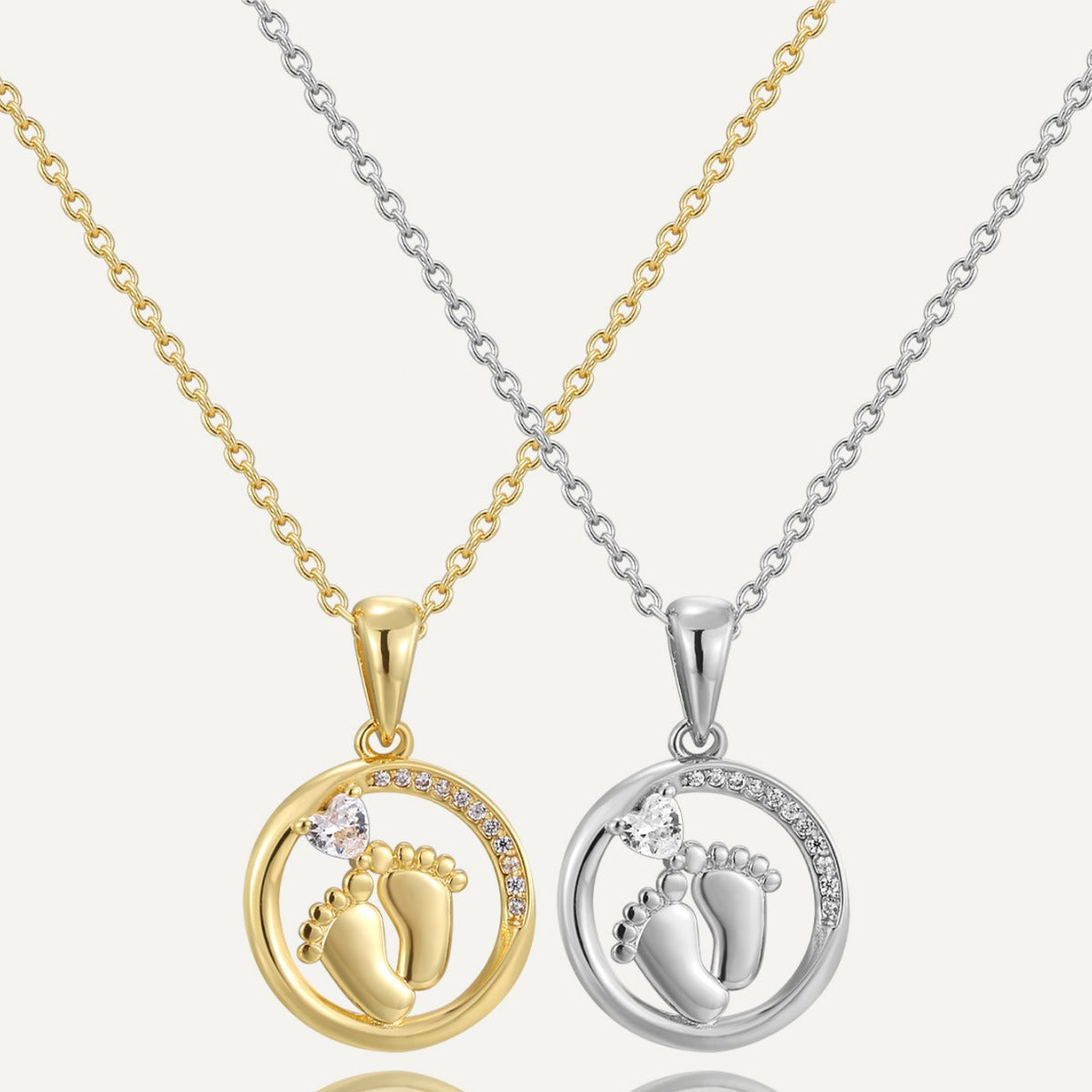 gold plated and silver-finish brass footprint pendant necklaces