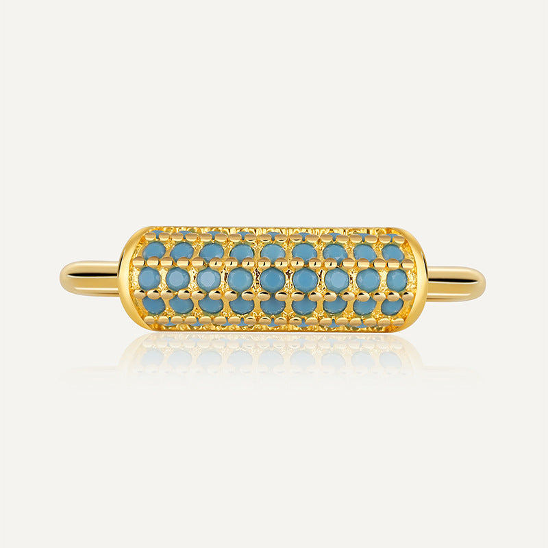 front view of gold plated lattice ring with turquoise-color inlays